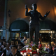 People gather around a statue depicting Juan Gabriel in Mexico City’s Garibaldi plaza, to bid their idol goodbye.